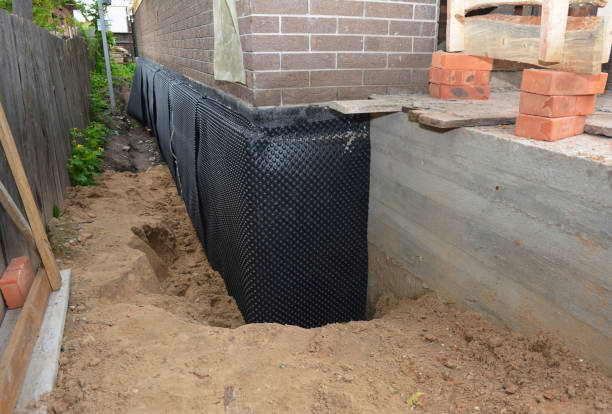 SJ Waterproofing Pros technician performing targeted Vapor Barrier Installation assessment in Stevenson, MD